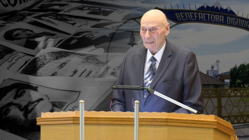 Ewald Frank preaching at a pulpit