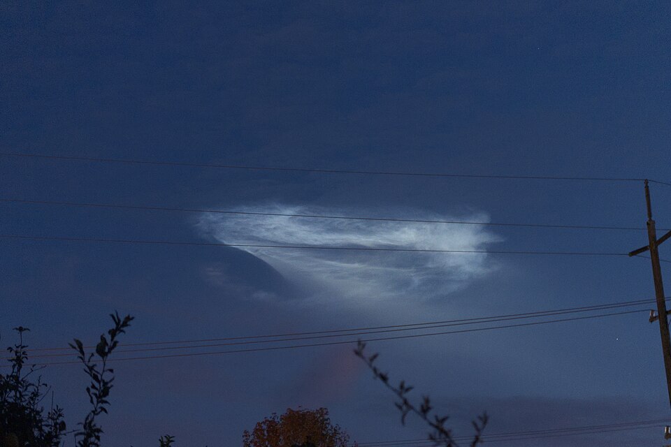 Glowing twilight rocket plume from a SpaceX launch over Vandenberg, California