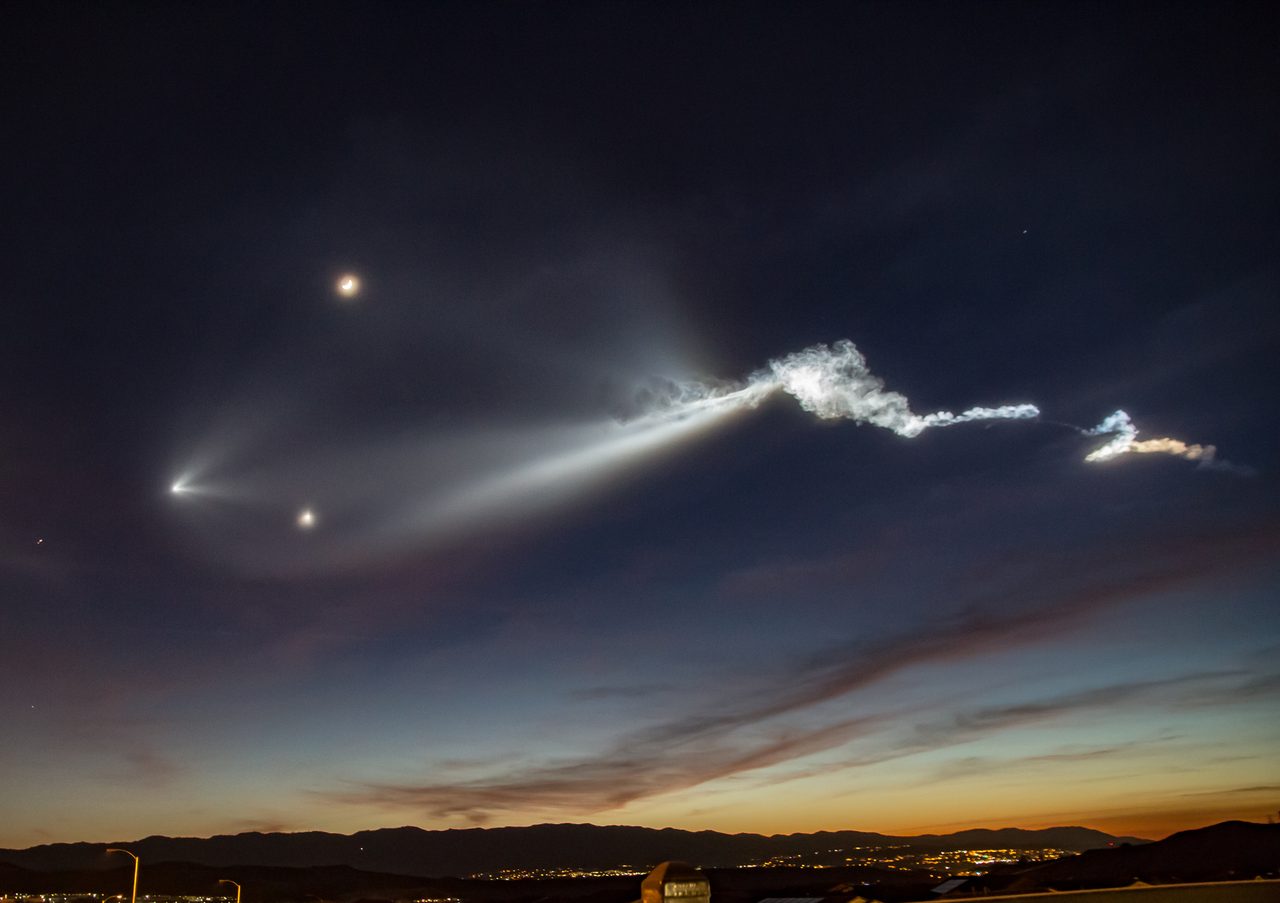 SpaceX Falcon 9 twilight launch plume glowing over Southern California